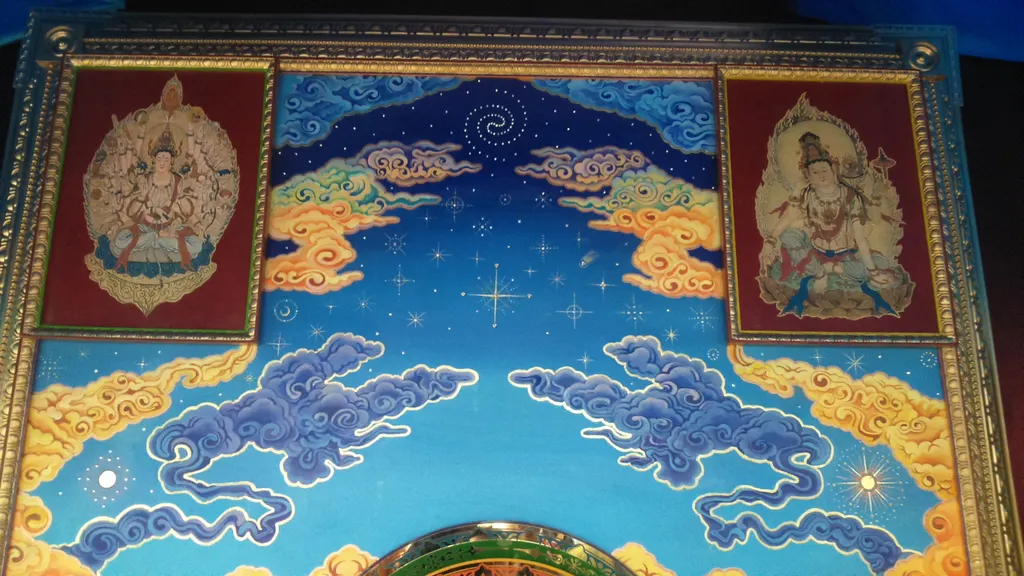 The upper panel: clouds and two deities
